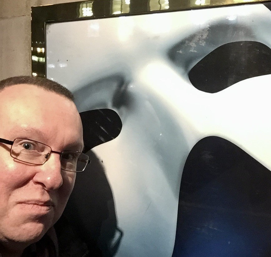 Peter Cavanna selfie with the Phantom of the Opera poster.