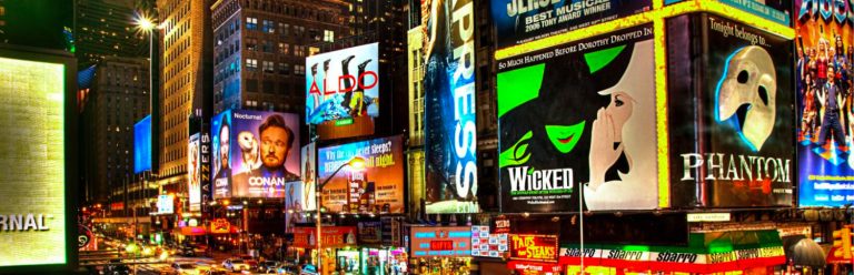 SeatPlan launch in NYC header image, showing Times Square adverts lit up at night.
